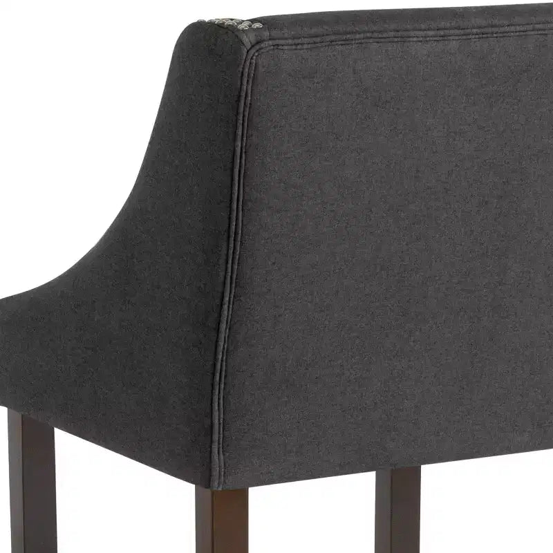 Sgabello da bancone in Leathersoft nero/antracite/grigio chiaro e tessuto, struttura in legno, finiture con borchie, 1 posto