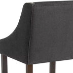 Sgabello da bancone in Leathersoft nero/antracite/grigio chiaro e tessuto, struttura in legno, finiture con borchie, 1 posto