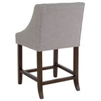 Sgabello da bancone in Leathersoft nero/antracite/grigio chiaro e tessuto, struttura in legno, finiture con borchie, 1 posto