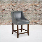 Sgabello da bancone in Leathersoft nero/antracite/grigio chiaro e tessuto, struttura in legno, finiture con borchie, 1 posto
