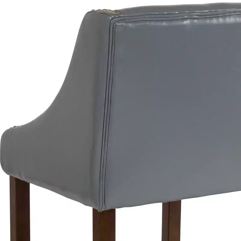 Sgabello da bancone in Leathersoft nero/antracite/grigio chiaro e tessuto, struttura in legno, finiture con borchie, 1 posto