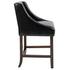Sgabello da bancone in Leathersoft nero/antracite/grigio chiaro e tessuto, struttura in legno, finiture con borchie, 1 posto